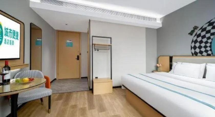 Bed in City Comfort Inn Shaoguan Biguiyuan Phoenix City Gold Village