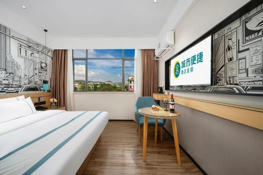 Bed in City Comfort Inn Shaoguan Biguiyuan Phoenix City Gold Village