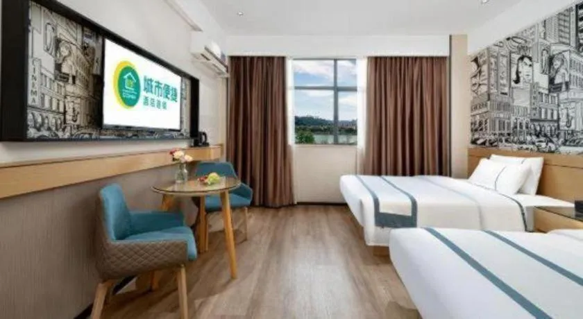 Bed in City Comfort Inn Shaoguan Biguiyuan Phoenix City Gold Village