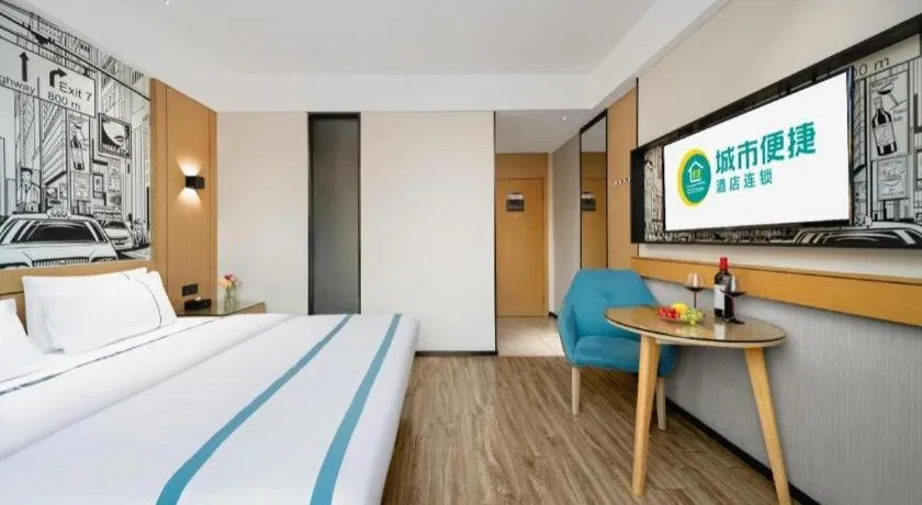 Bed in City Comfort Inn Shaoguan Biguiyuan Phoenix City Gold Village