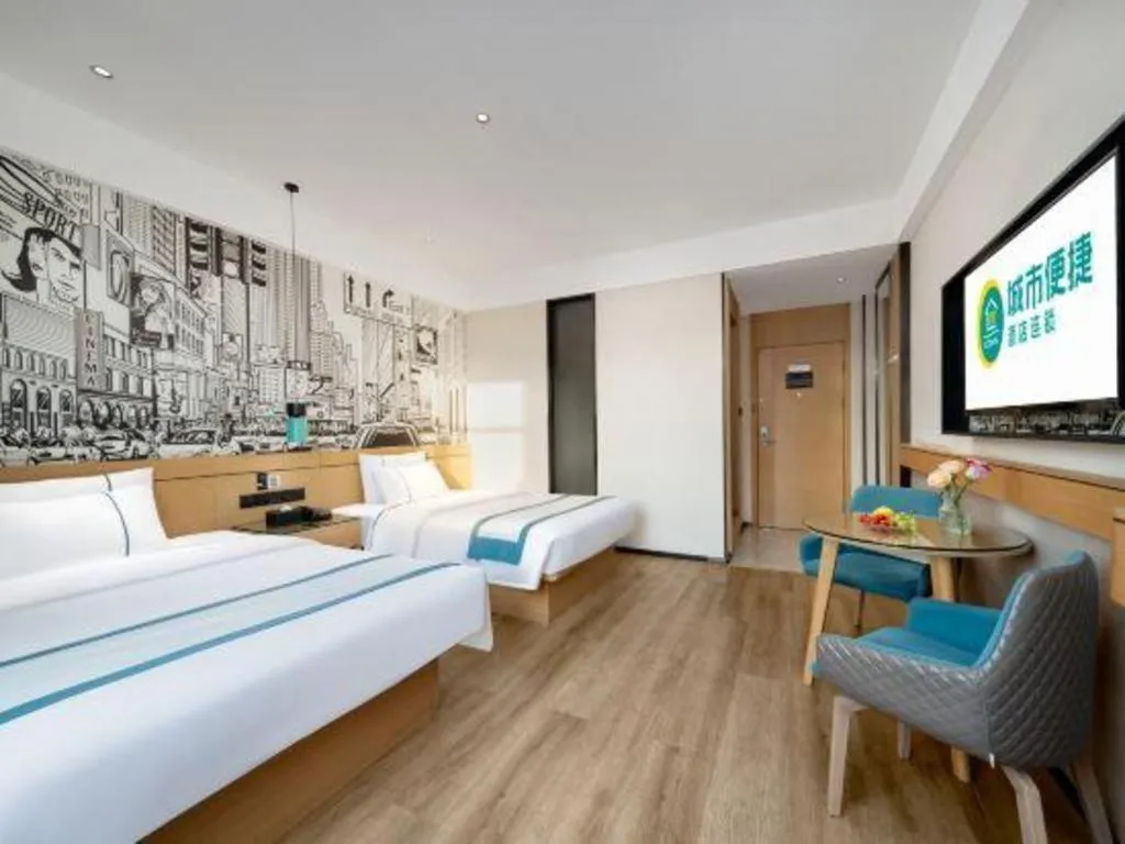 Bed in City Comfort Inn Shaoguan Biguiyuan Phoenix City Gold Village