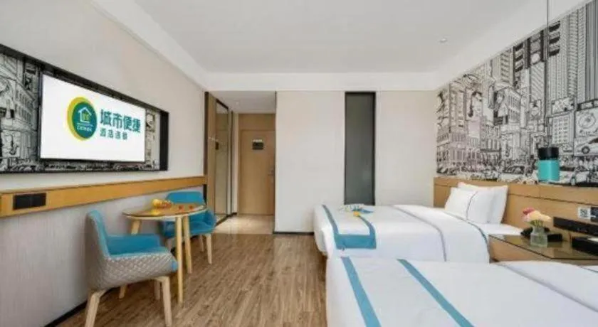 Bed in City Comfort Inn Shaoguan Biguiyuan Phoenix City Gold Village