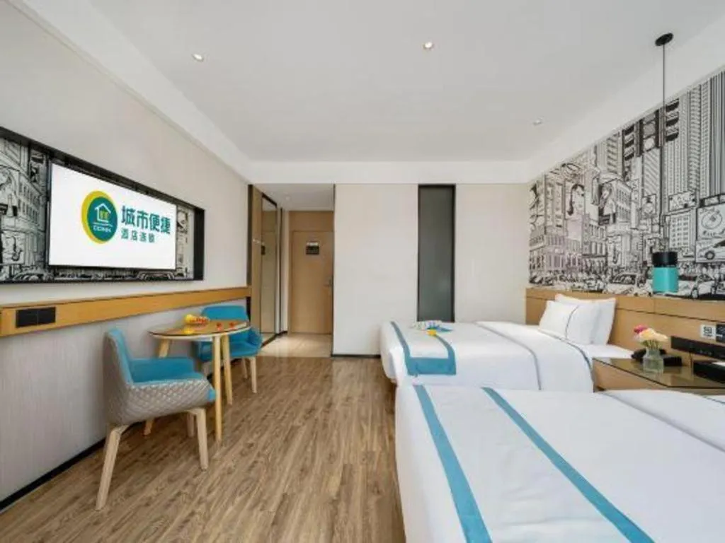 Bed in City Comfort Inn Shaoguan Biguiyuan Phoenix City Gold Village