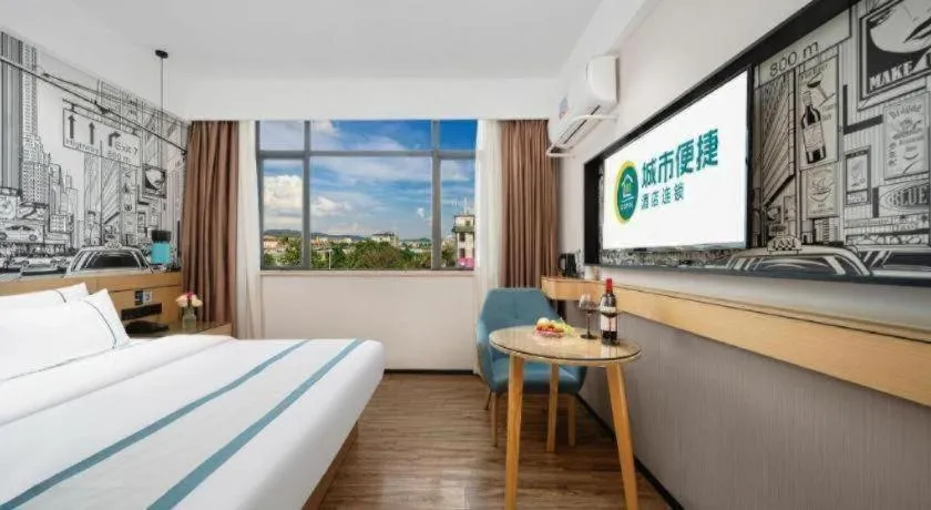 Bed in City Comfort Inn Shaoguan Biguiyuan Phoenix City Gold Village