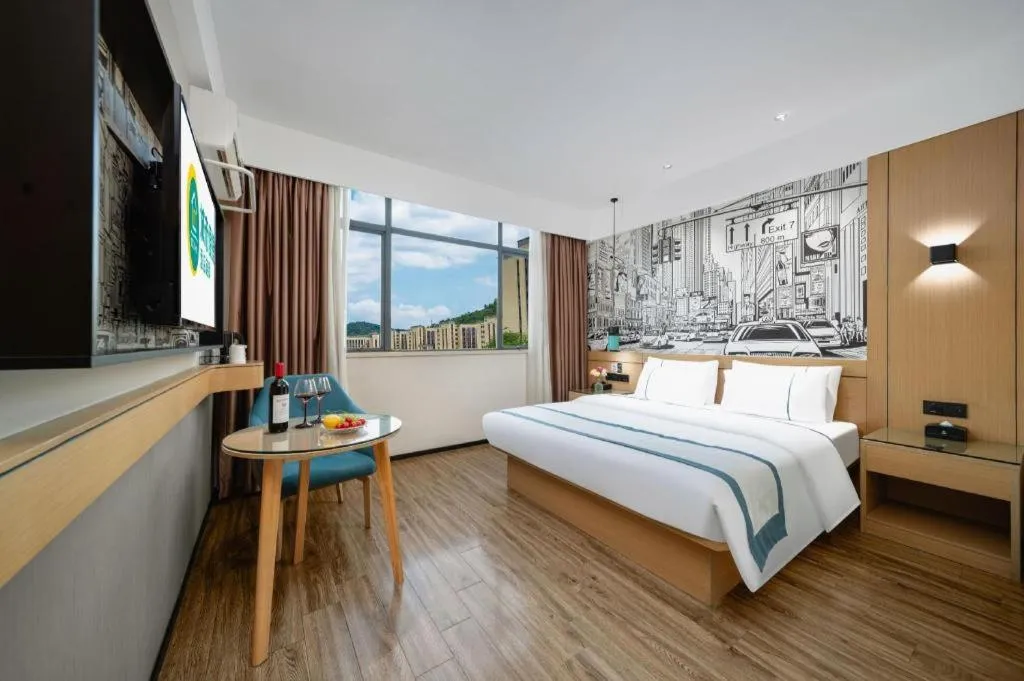 Bed in City Comfort Inn Shaoguan Biguiyuan Phoenix City Gold Village