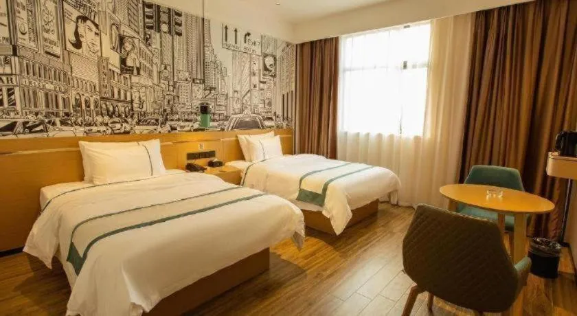 Bed in City Comfort Inn Shaoguan Biguiyuan Phoenix City Gold Village