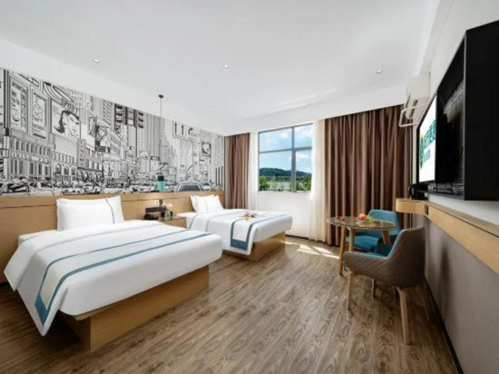 Bed in City Comfort Inn Shaoguan Biguiyuan Phoenix City Gold Village