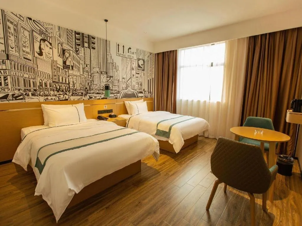 Bed in City Comfort Inn Shaoguan Biguiyuan Phoenix City Gold Village