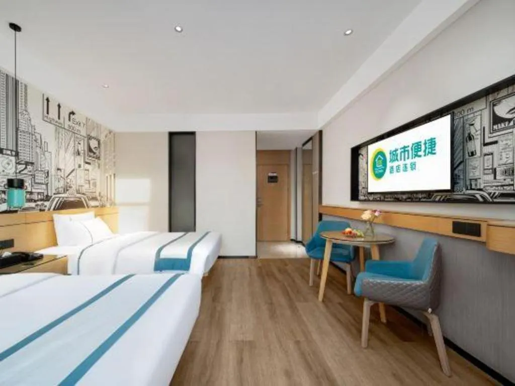 Bed in City Comfort Inn Shaoguan Biguiyuan Phoenix City Gold Village