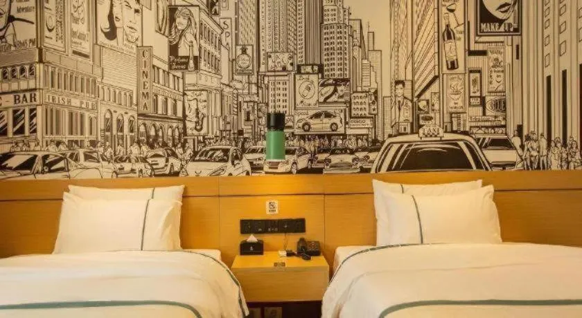 Bed in City Comfort Inn Shaoguan Biguiyuan Phoenix City Gold Village