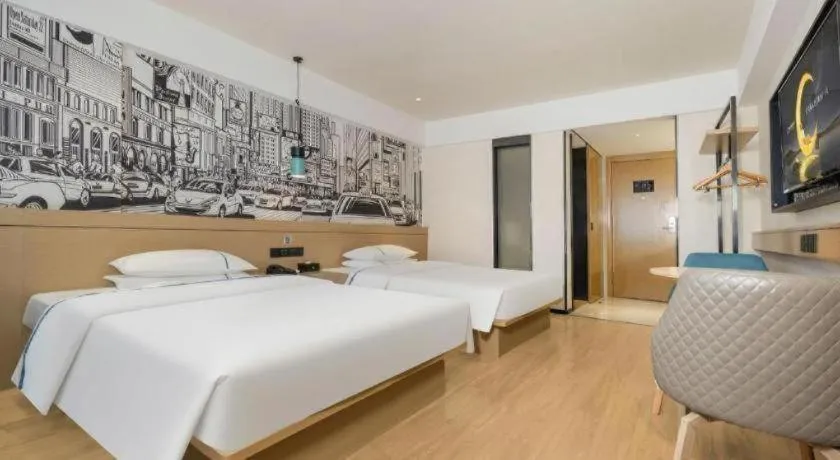 Bed in City Comfort Inn Wuzhou Sun Plaza Wanda