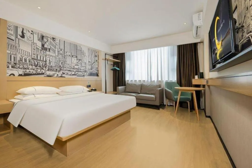 Bed in City Comfort Inn Wuzhou Sun Plaza Wanda