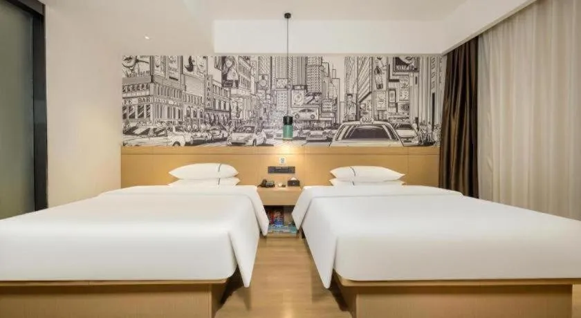 Bed in City Comfort Inn Wuzhou Sun Plaza Wanda