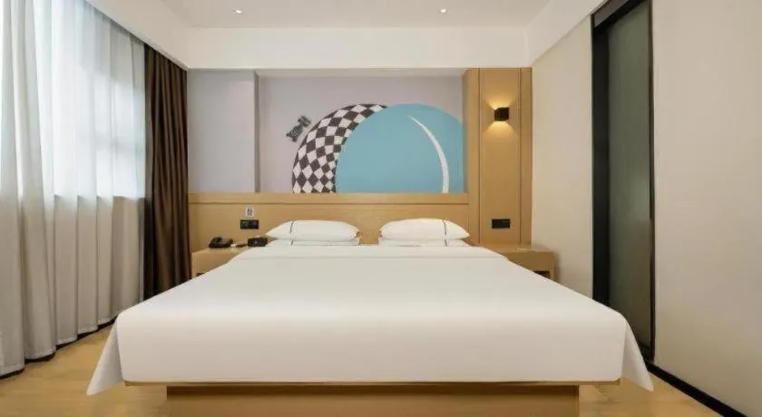 Bed in City Comfort Inn Wuzhou Sun Plaza Wanda