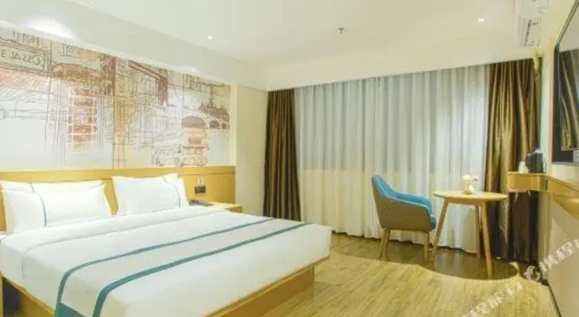 Bed in City Comfort Inn Wuzhou Sun Plaza Wanda Bed in City Comfort Inn Wuzhou Sun Plaza Wanda