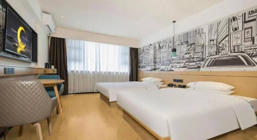 Bed in City Comfort Inn Wuzhou Sun Plaza Wanda