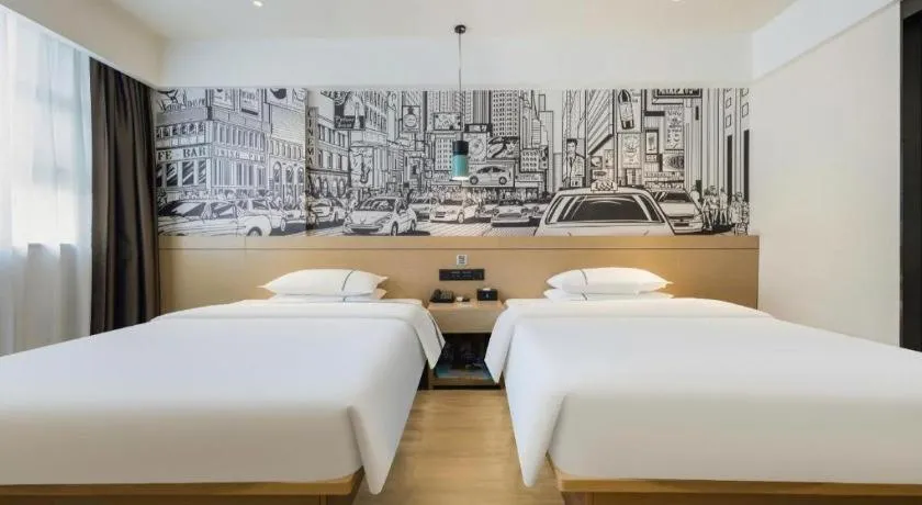 Bed in City Comfort Inn Wuzhou Sun Plaza Wanda