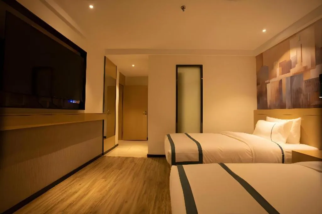 Bed in City Comfort Inn Huaihua East Station