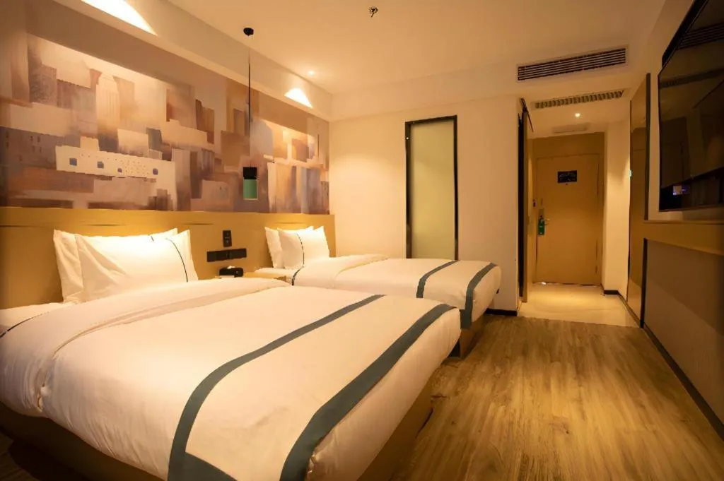 Bed in City Comfort Inn Huaihua East Station