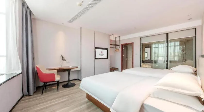 Bed in Borrman Hotel Yunfu Xinxing County Bus Station