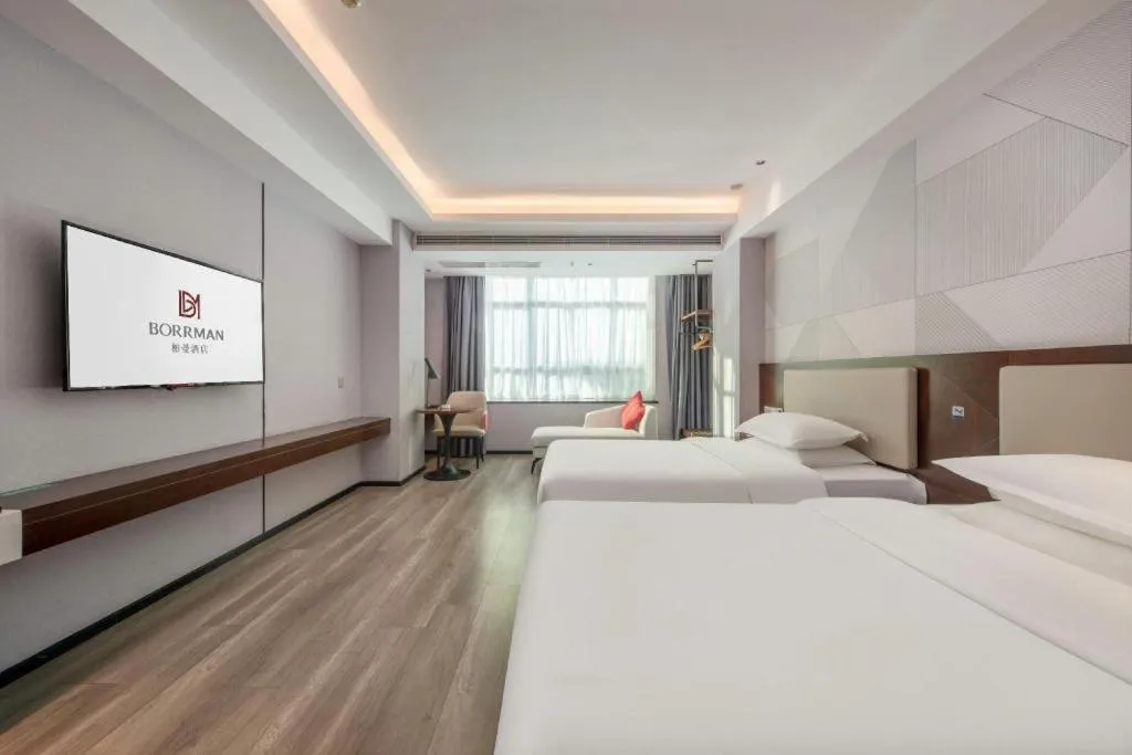 Bed in Borrman Hotel Yunfu Xinxing County Bus Station