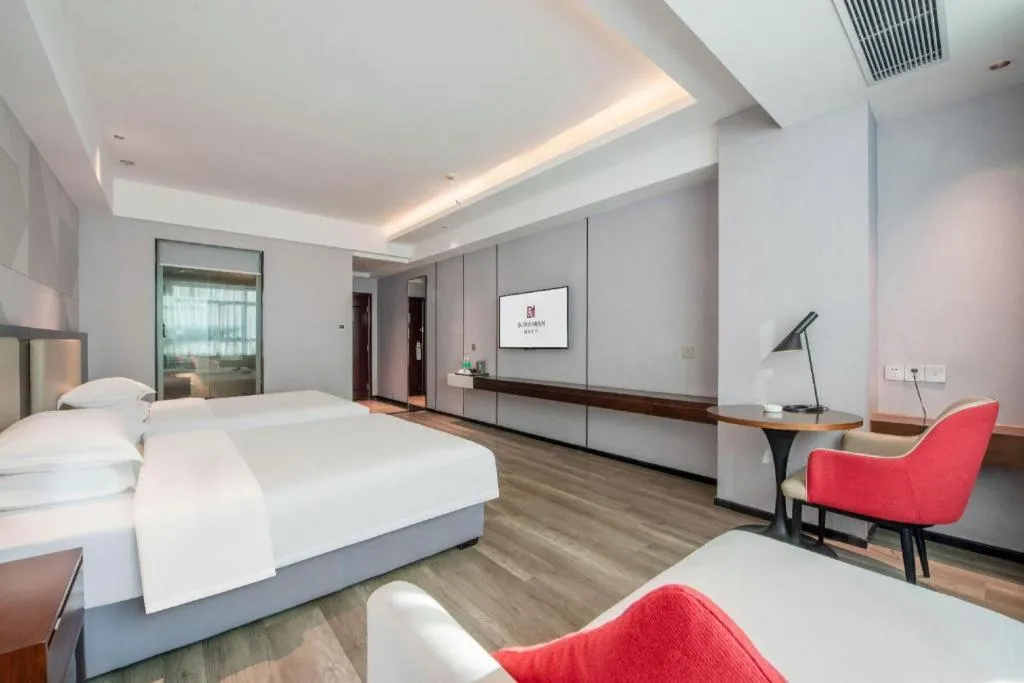 Bed in Borrman Hotel Yunfu Xinxing County Bus Station