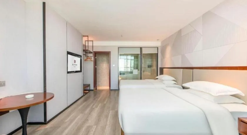 Bed in Borrman Hotel Yunfu Xinxing County Bus Station