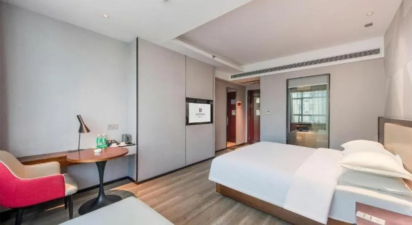 Bed in Borrman Hotel Yunfu Xinxing County Bus Station