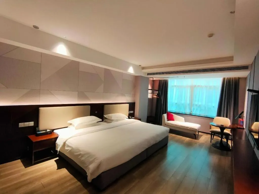 Bed in Borrman Hotel Yunfu Xinxing County Bus Station