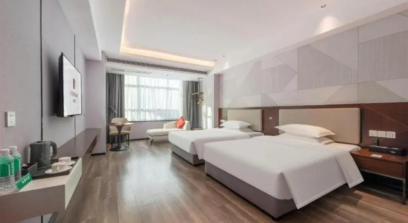 Bed in Borrman Hotel Yunfu Xinxing County Bus Station