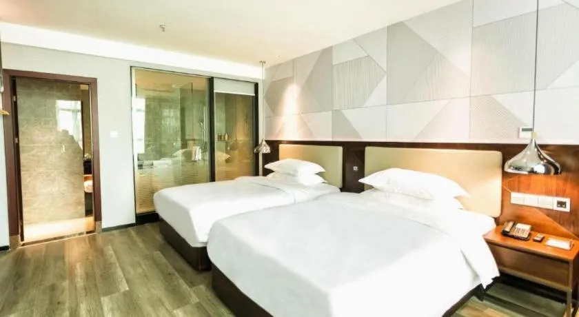 Bed in Borrman Hotel Yunfu Xinxing County Bus Station