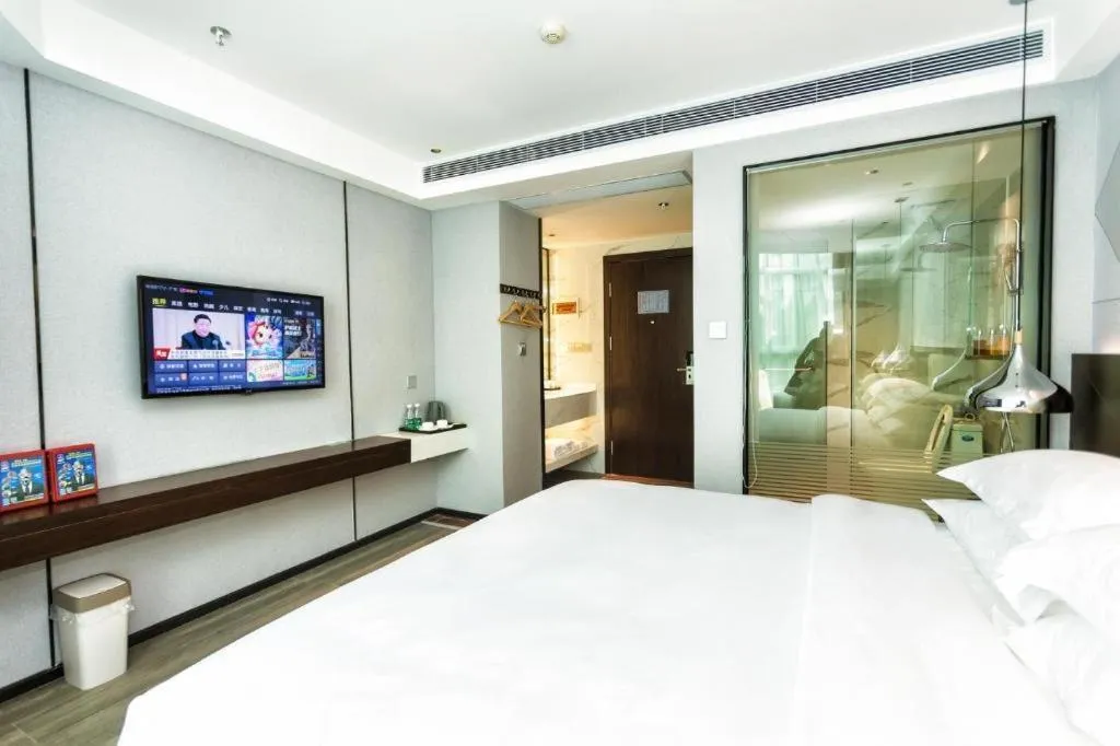 Bed in Borrman Hotel Yunfu Xinxing County Bus Station