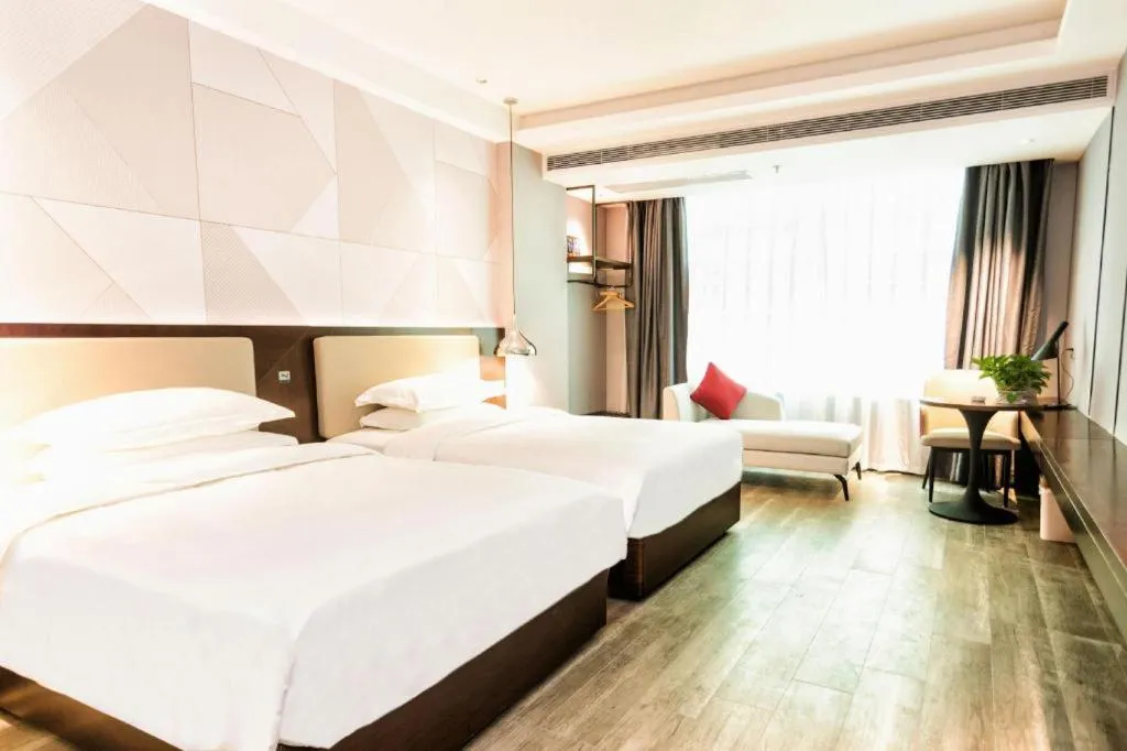 Bed in Borrman Hotel Yunfu Xinxing County Bus Station