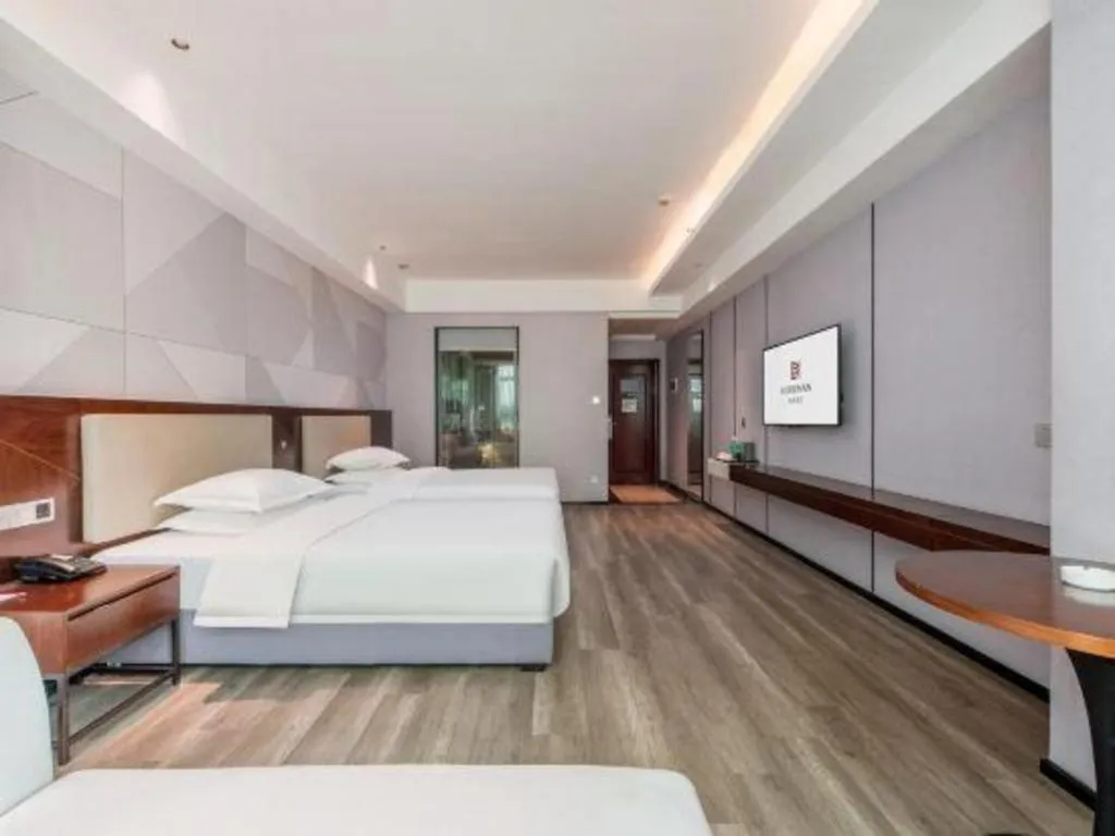 Bed in Borrman Hotel Yunfu Xinxing County Bus Station