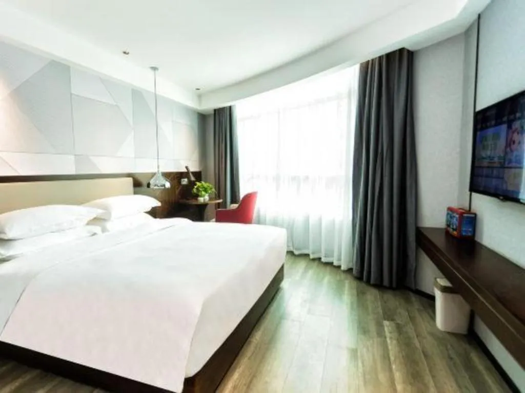 Bed in Borrman Hotel Yunfu Xinxing County Bus Station