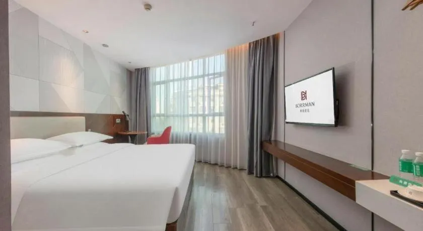 Bed in Borrman Hotel Yunfu Xinxing County Bus Station