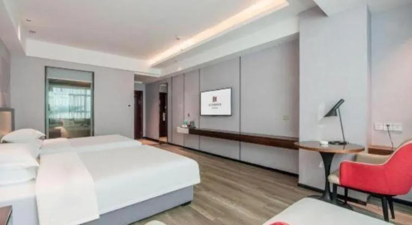 Bed in Borrman Hotel Yunfu Xinxing County Bus Station