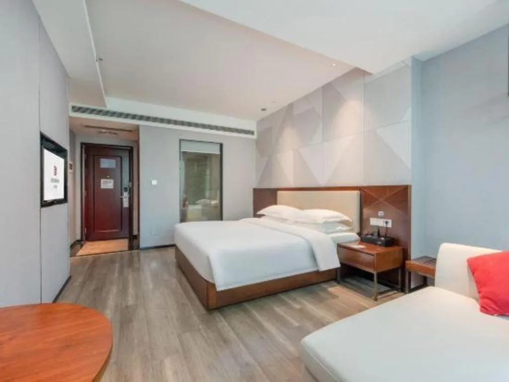 Bed in Borrman Hotel Yunfu Xinxing County Bus Station