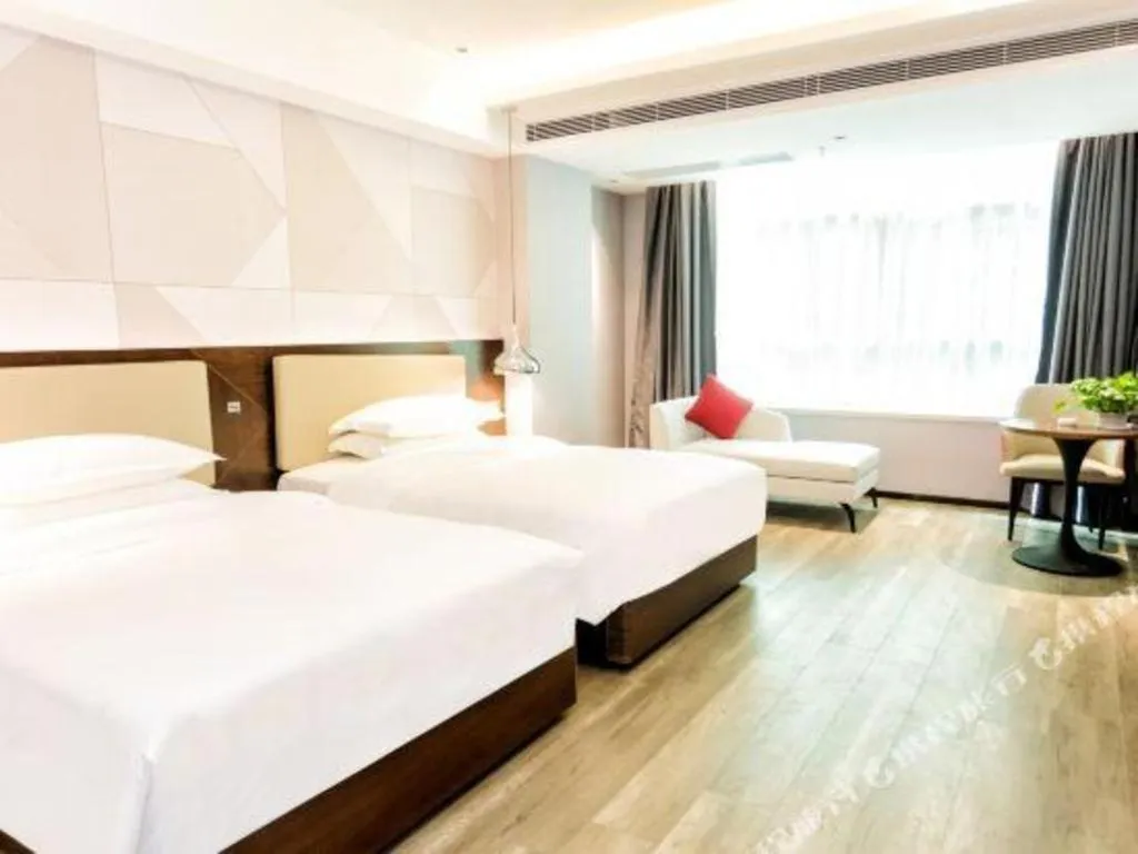 Bed in Borrman Hotel Yunfu Xinxing County Bus Station