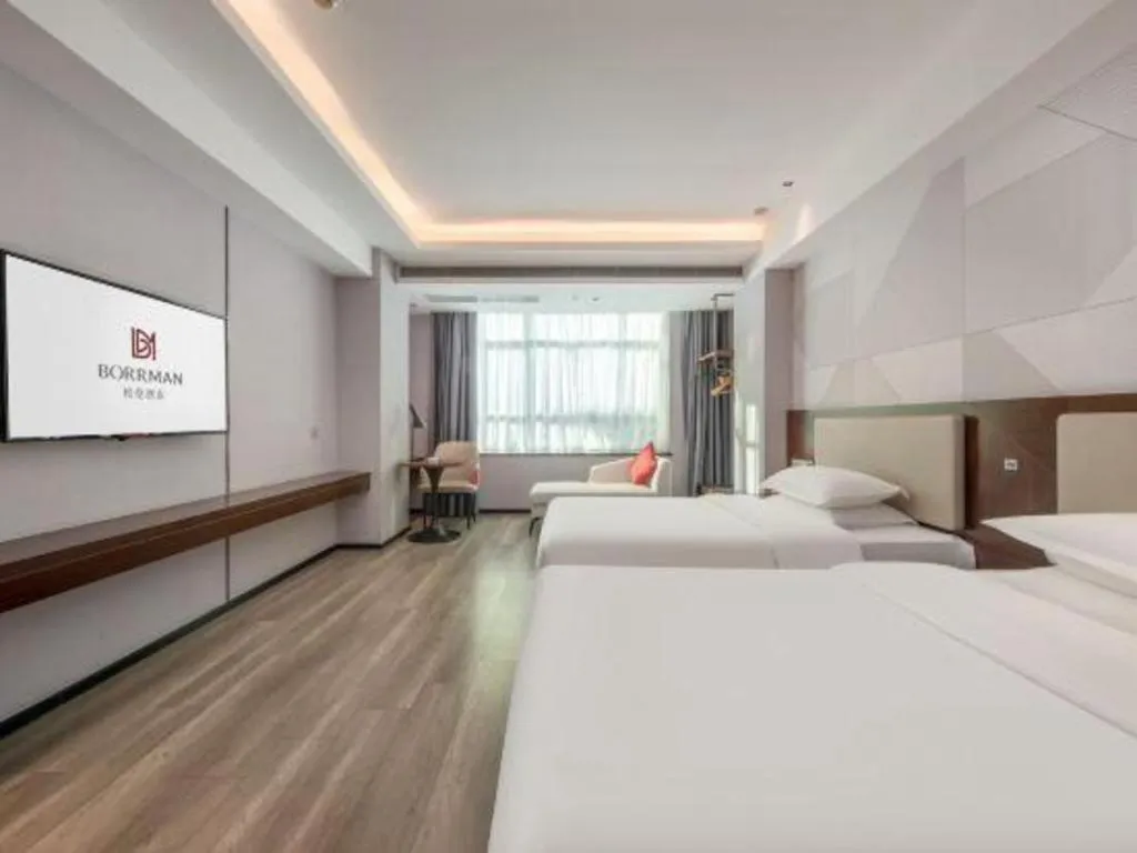 Bed in Borrman Hotel Yunfu Xinxing County Bus Station