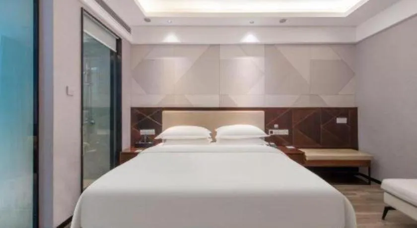 Bed in Borrman Hotel Yunfu Xinxing County Bus Station