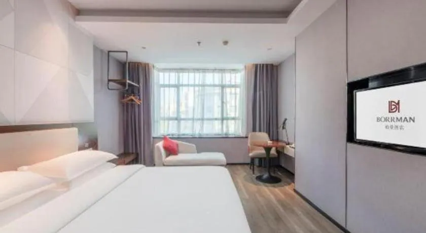 Bed in Borrman Hotel Yunfu Xinxing County Bus Station