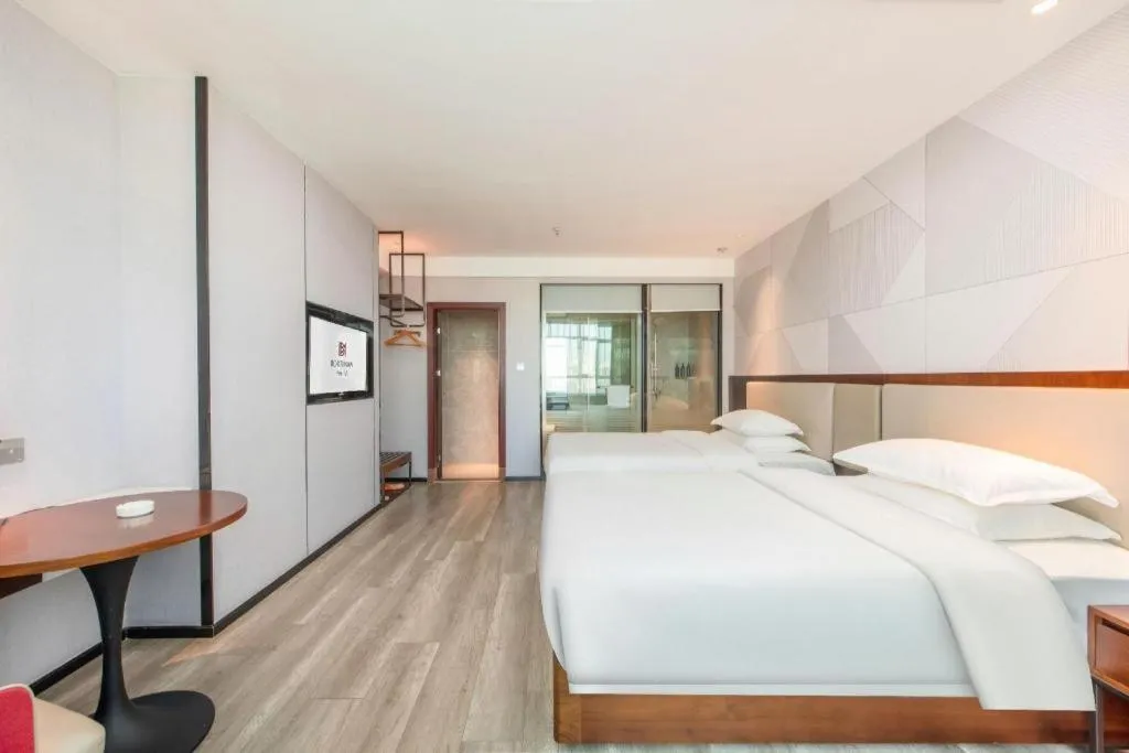 Bed in Borrman Hotel Yunfu Xinxing County Bus Station