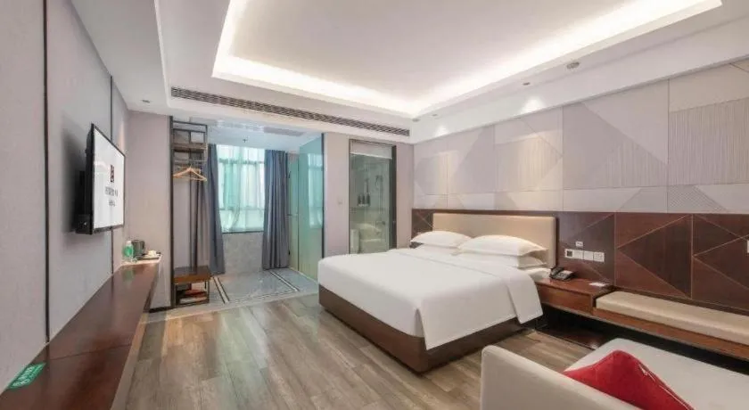 Bed in Borrman Hotel Yunfu Xinxing County Bus Station