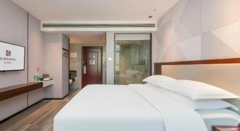 Bed in Borrman Hotel Yunfu Xinxing County Bus Station