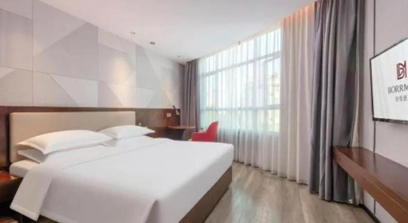 Bed in Borrman Hotel Yunfu Xinxing County Bus Station