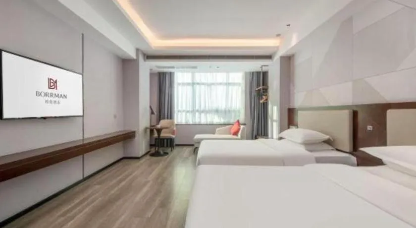 Bed in Borrman Hotel Yunfu Xinxing County Bus Station