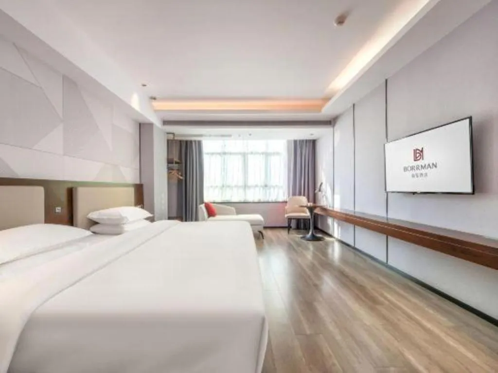 Bed in Borrman Hotel Yunfu Xinxing County Bus Station