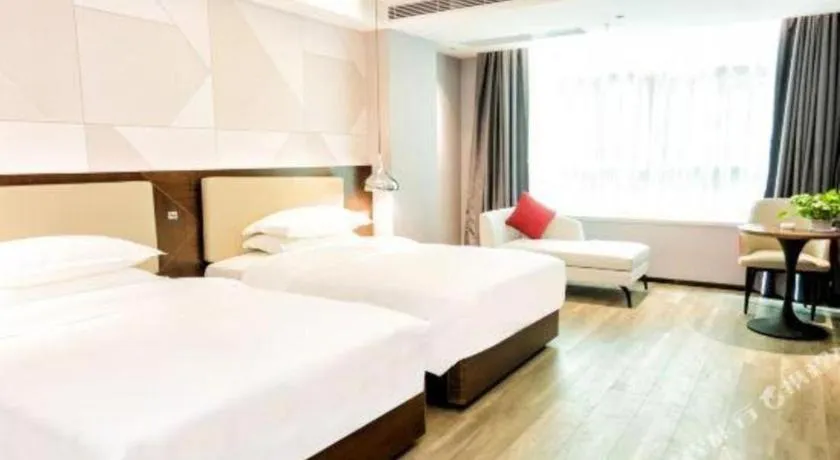 Bed in Borrman Hotel Yunfu Xinxing County Bus Station