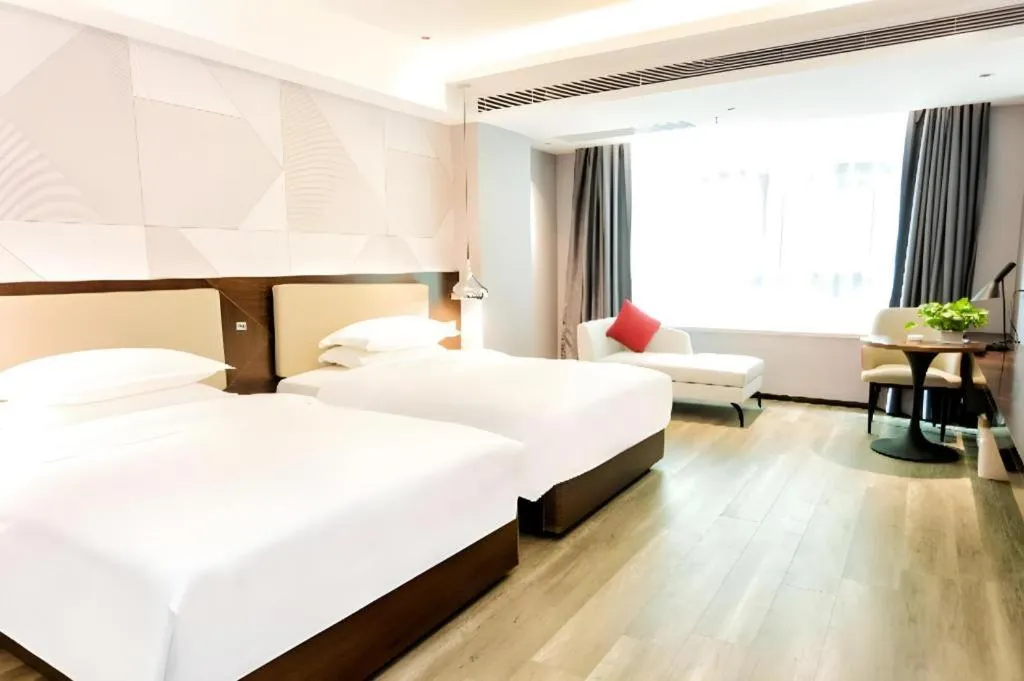 Bed in Borrman Hotel Yunfu Xinxing County Bus Station